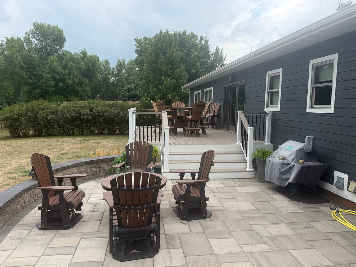 Outdoor swivel glider chairs around a 43in round poly fire pit table - Salt and Sand Patio Co