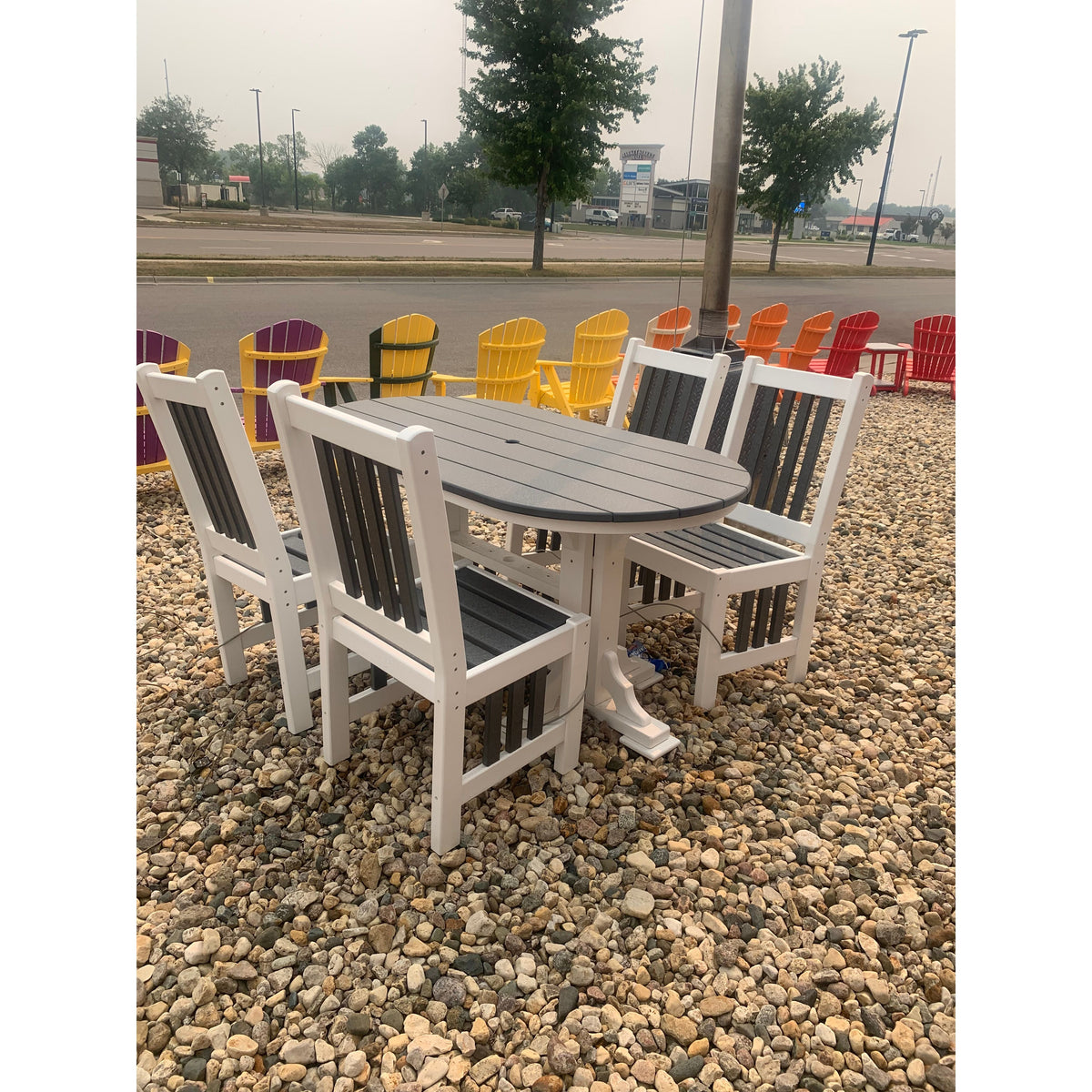 Creekside 5' Oval Dining Table with 4 Swivel Chairs