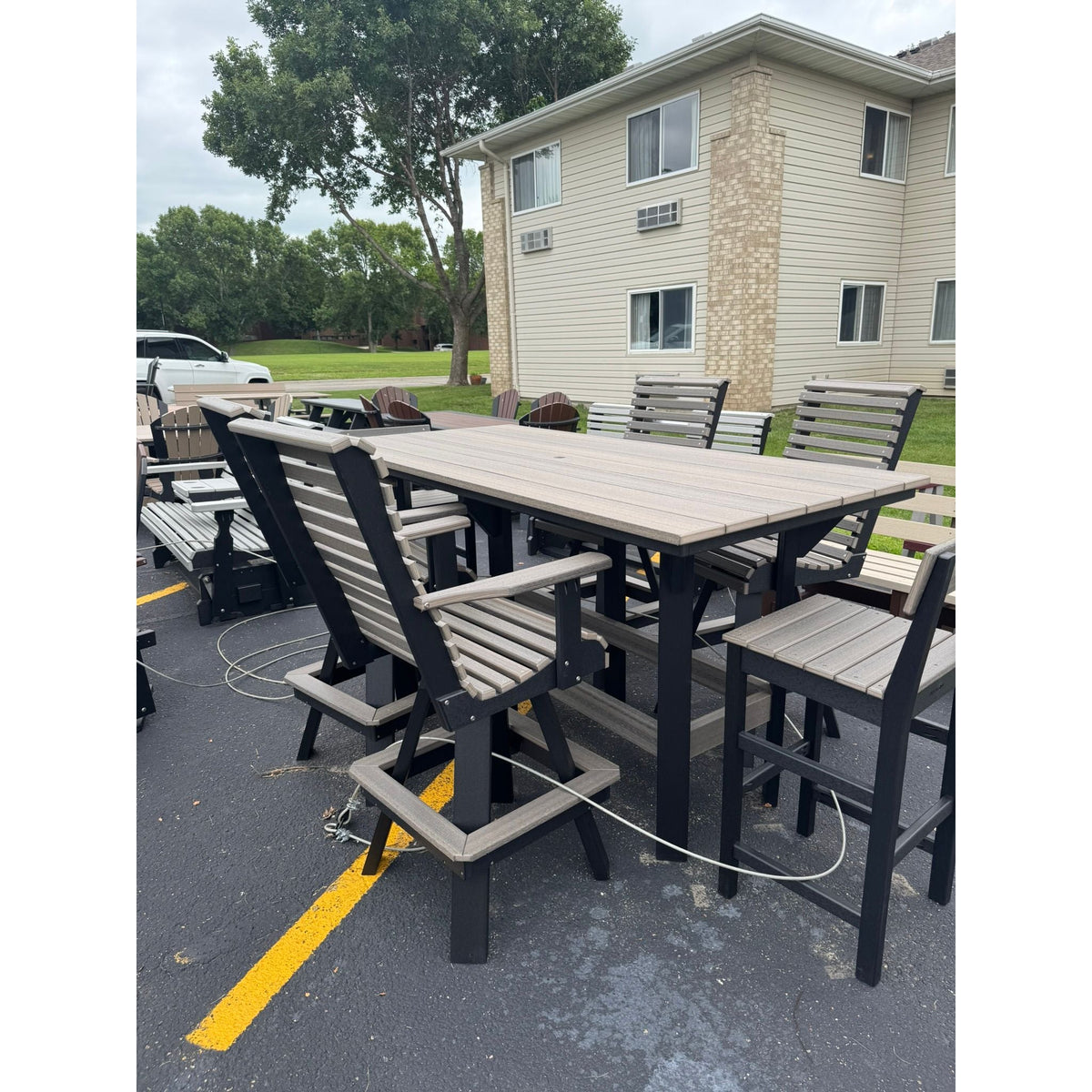 7' Bar Table with 4 Rollback Chairs and 2 stationary chairs in Black and Coastal Gray